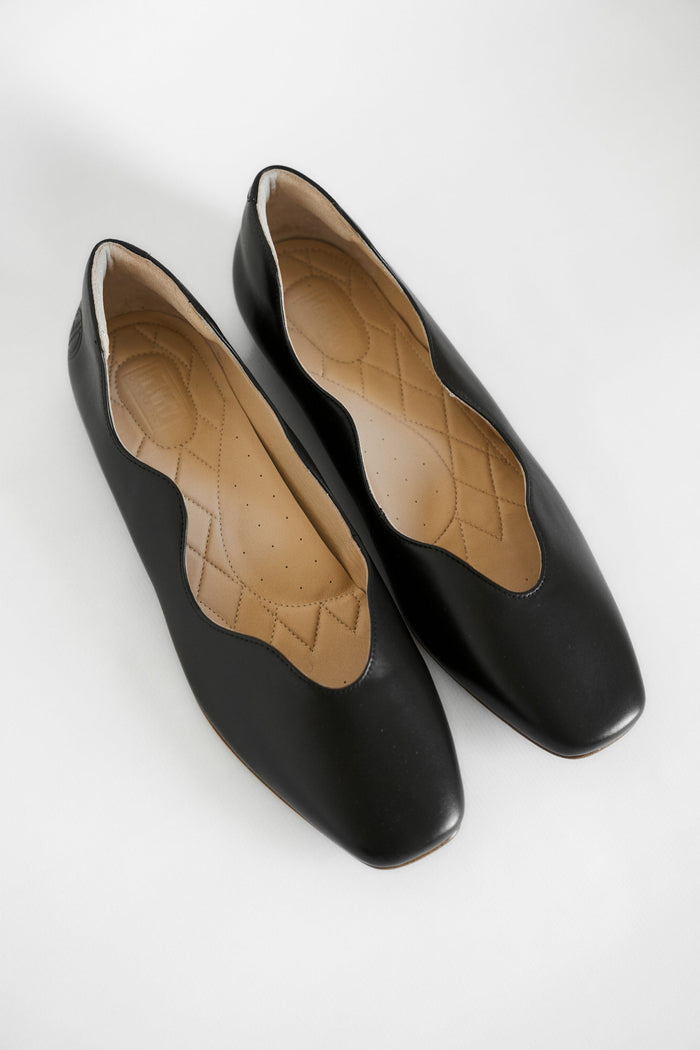 Where can I find premium women's shoes in US size 15?